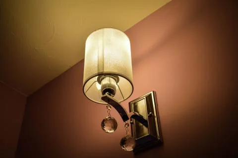 Wall lamp in shadow Stock Photos