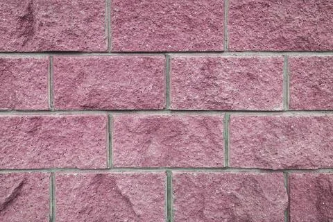 A wall of large brick for a background paint. Stock Photos