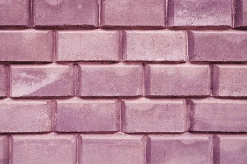 A wall of large brick for a background paint. Stock Photos