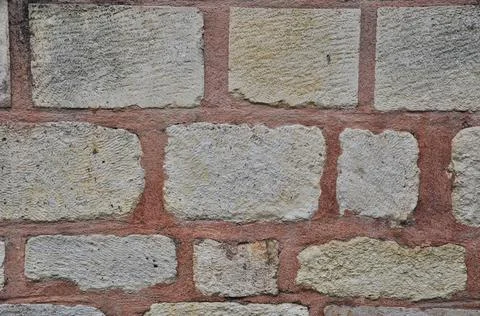 A wall of large stones. Background, texture. Stock Photos