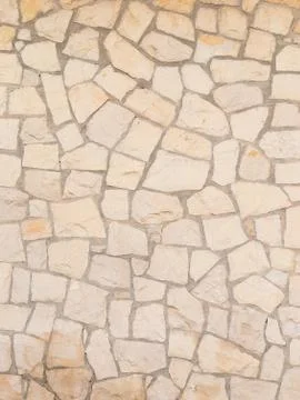 Wall light beige stone Stock Photos