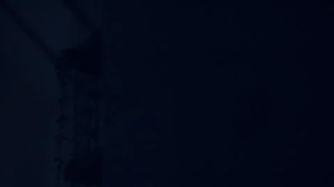 A wall light switch being turned off at night Stock Footage 339197550