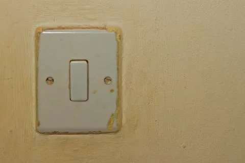 Wall with light switch Stock Photos
