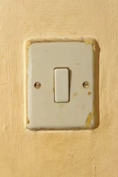 Wall with light switch Stock Photos