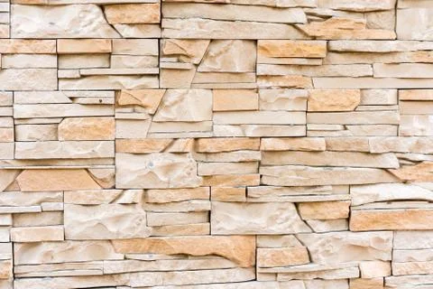 Wall of light untreated stone Stock Photos
