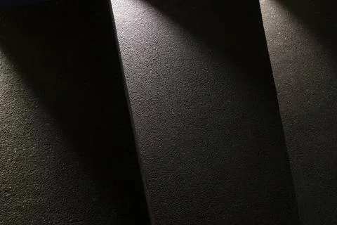 Wall, lighting. Light and shadow, texture background. Modern interiors, dark Stock Photos