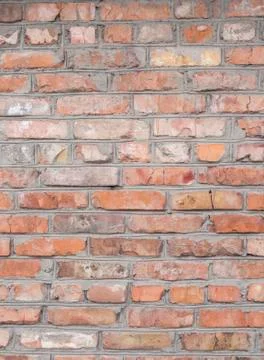 A wall lined with red brick Stock Photos