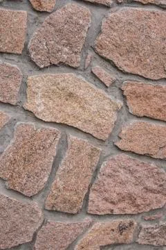 A wall lined with stone Stock Photos