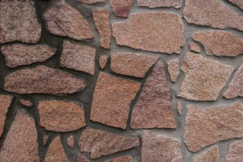 A wall lined with stone Stock Photos