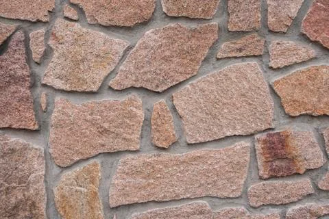 A wall lined with stone Stock Photos