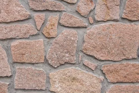 A wall lined with stone Stock Photos