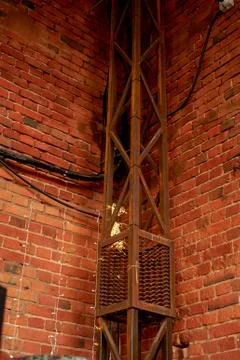 The wall of the loft is made of red brick with metal fittings.The style of Photos
