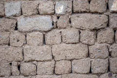 A wall made of bricks with a rough texture Stock-Fotos