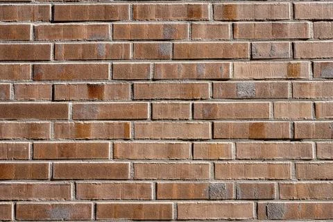 Wall made of brown bricks Foto stock