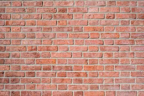 Wall made of clean red bricks Stock Photos