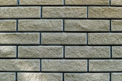 Wall made of facing bricks. Backgrounds, texture Stock Photos