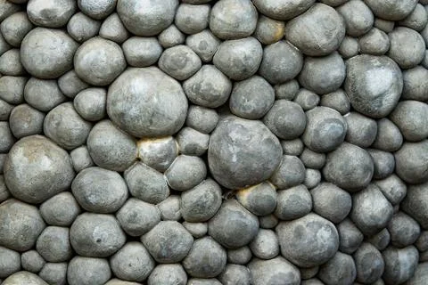 A wall made of large gray rocks Foto stock