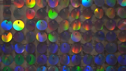 Wall made of many round sparkling sequins for fashion festive event or glamour Stock Footage 189516958