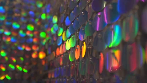 Wall made of many round sparkling sequins for fashion festive event or glamour Stock Footage 191744489