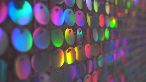 Wall made of many round sparkling sequins for fashion festive event or glamour Stock Footage 193969786