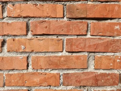The wall made of an old brown bricks Foto stock