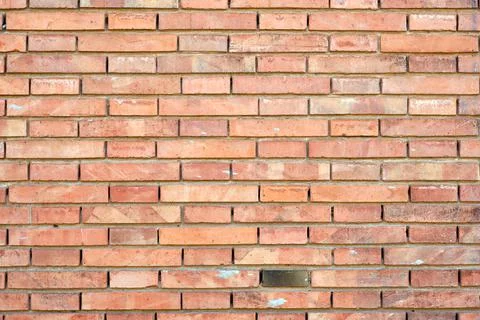 Wall made of orange clinker bricks Stock Photos