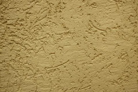 The wall is made of plaster. Rough surface. Solid color abstract background. Stock Photos