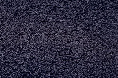 The wall is made of plaster. Rough surface. Solid color abstract background. Stock Photos