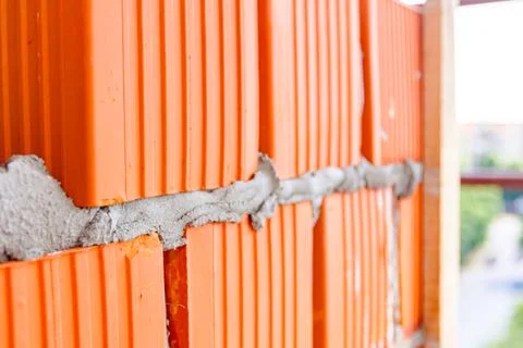 Wall made of red blocks, brickwork, building site Fotos de archivo