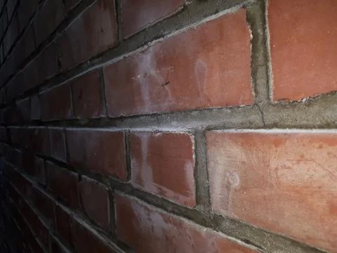 Wall made of red brick Stock Photos