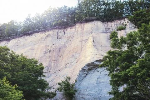 Wall made of sand, sand cliff. High quality photo Stock Photos