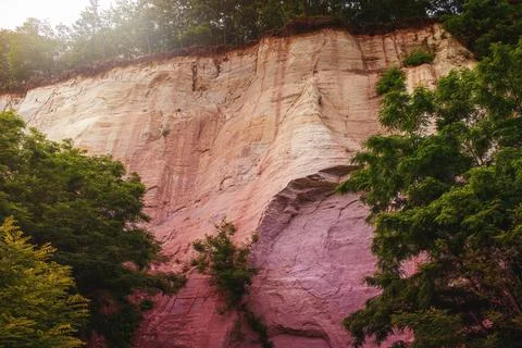 Wall made of sand, sand cliff. High quality photo Stock Photos