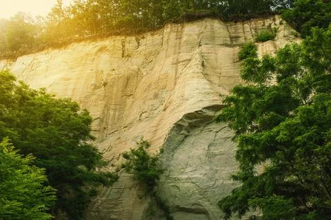 Wall made of sand, sand cliff. High quality photo Stock Photos