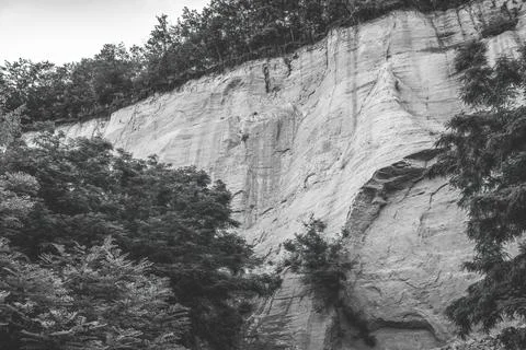 Wall made of sand, sand cliff. High quality photo Stock Photos