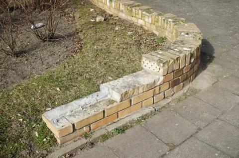 Wall made of several rectangular stones in the middle of the construction 스톡 사진