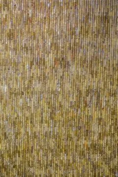 Wall, marble pieces. The pattern consists of granite cylinders. Backdrop, bac Stock Photos