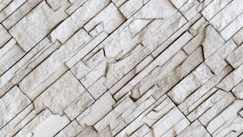 Wall, masonry of flat chipped stones beige split uneven convex, rotating 스톡 동영상 255033174