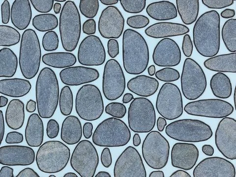 Wall masonry with river stone. flat stone texture background Stock Photos