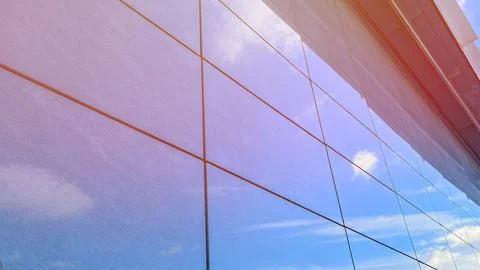 Wall of modern building with reflection of clouds, Granite building wall with Stock Photos