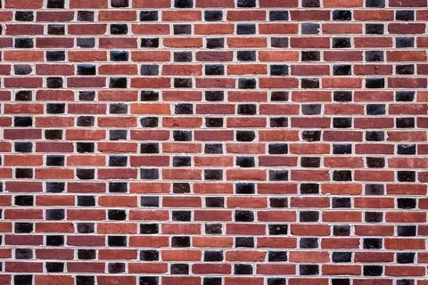 Wall of modern red black brick, background, texture Foto stock