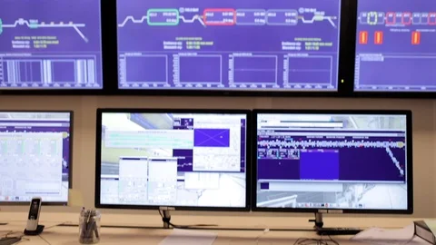 A wall of monitors in a control room.  Stock Footage 129357566