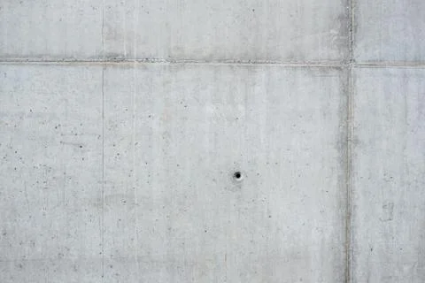 Wall of monolithic concrete Stock Photos