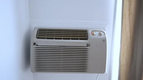 Wall mounted air conditioner control panel. Adjustable temperature and mode Stock Footage 332185939