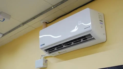 Wall mounted air conditioner inside modern educational classroom Stock Footage 337168807