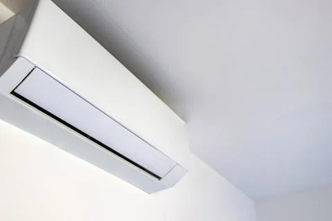 Wall Mounted Air Conditioner Inside Simple Thai Hotel Room Interior Thailand. Stock Photos