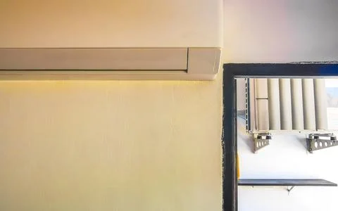 Wall Mounted Air Conditioner Inside Simple Thai Hotel Room Interior Thailand. Stock Photos