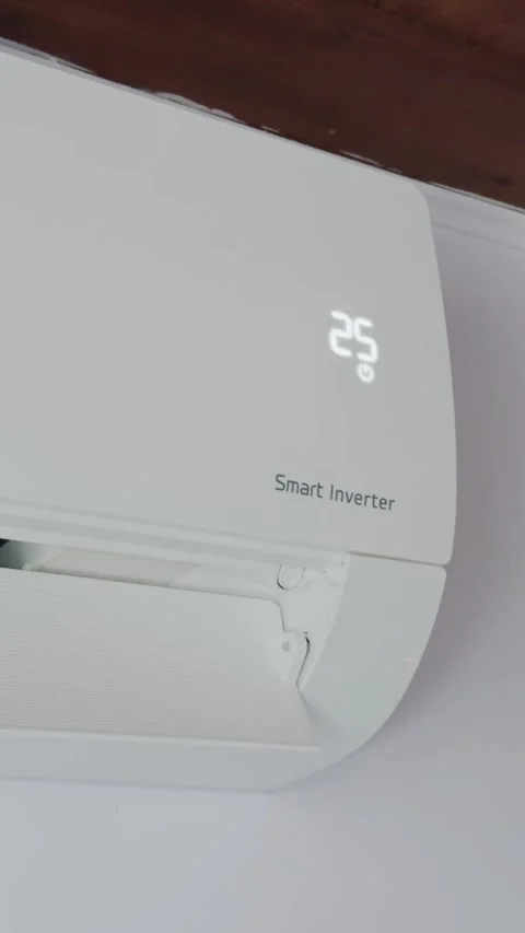 Wall mounted air conditioner lowering temperature Stock-Footage 328822501