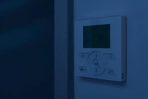 Wall-mounted air-conditioning remote controller Stock Photos