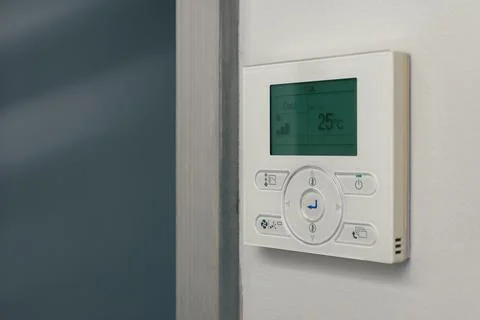 Wall-mounted air-conditioning remote controller Stock Photos