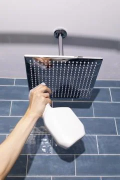 Wall Mounted Ceiling Shower Head with Rainfall Effect Covered By Limescale Stock Photos